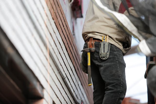 Person checking roof